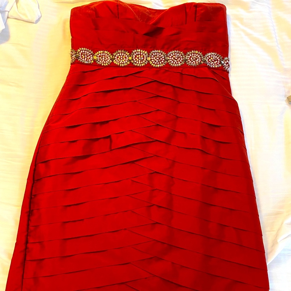 Gem-belted tulip bodycon strapless dress